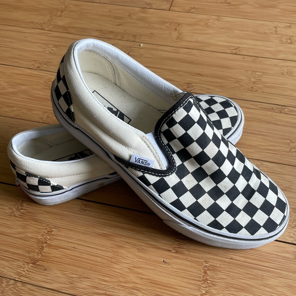 Black and cream checkered women’s slip on vans! Worn once, in EUC